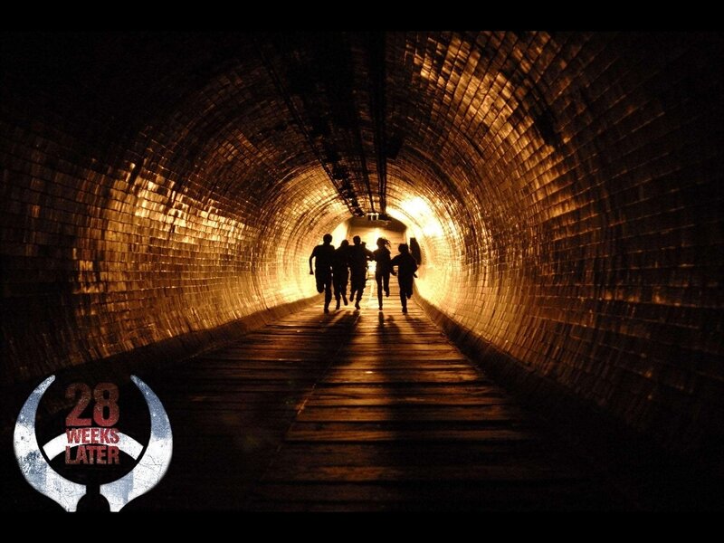Group running through tunnel