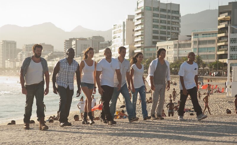 Group walking on beach
