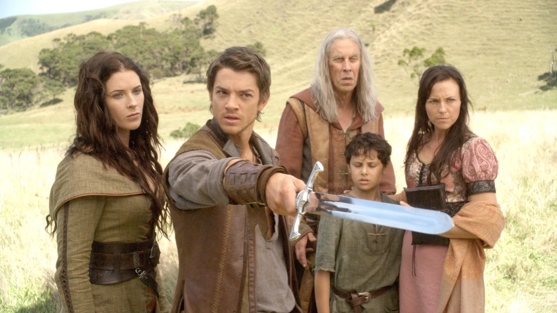 group with sword in field
