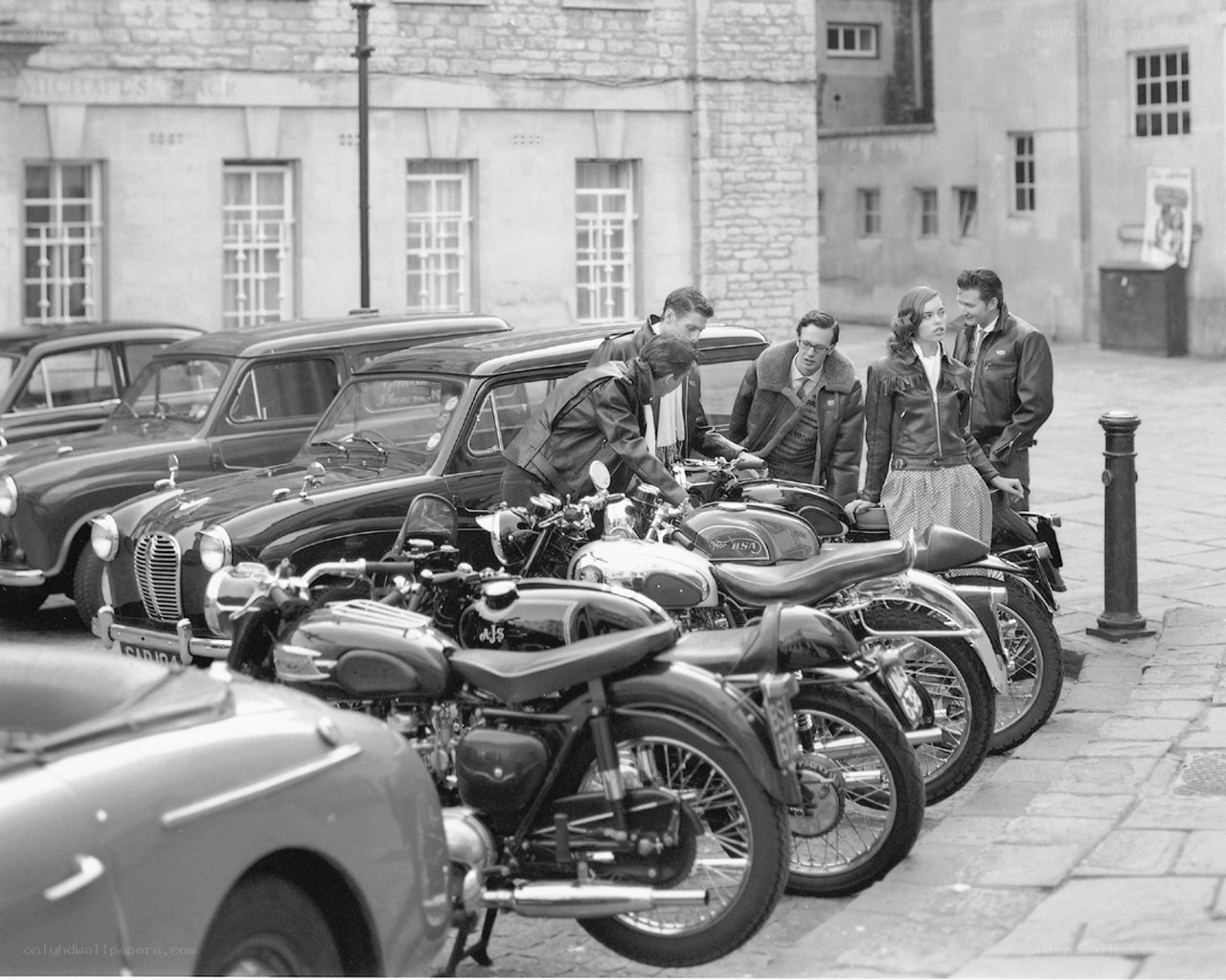 Group with vintage motorcycles