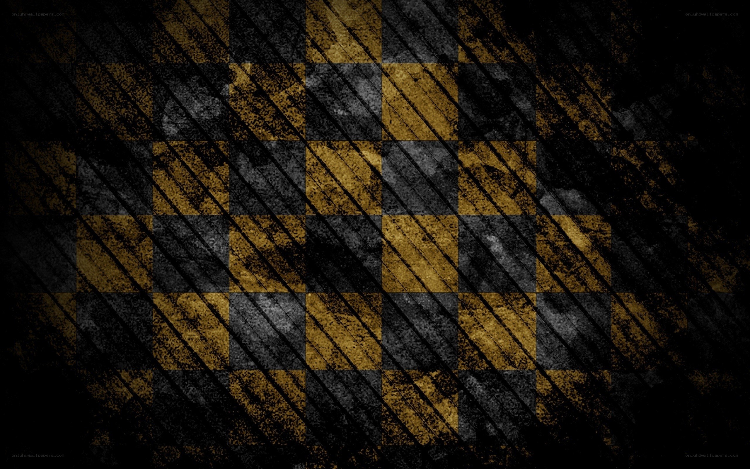 grungy black and gold checkered pattern