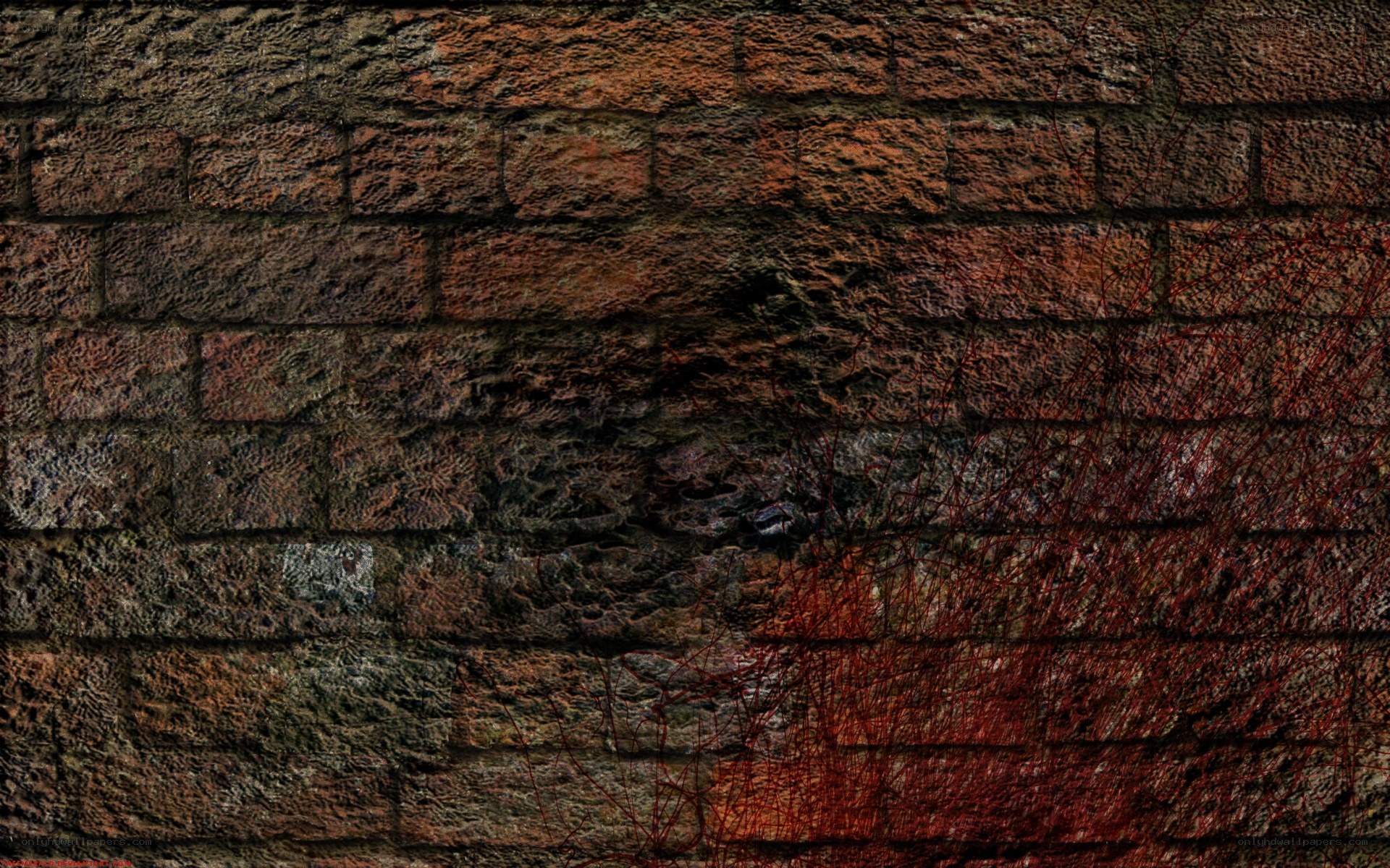 grungy brick wall with red stains