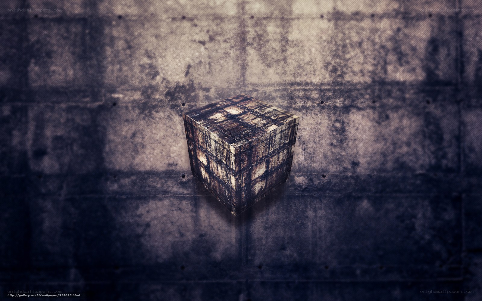 grungy cube on concrete wall