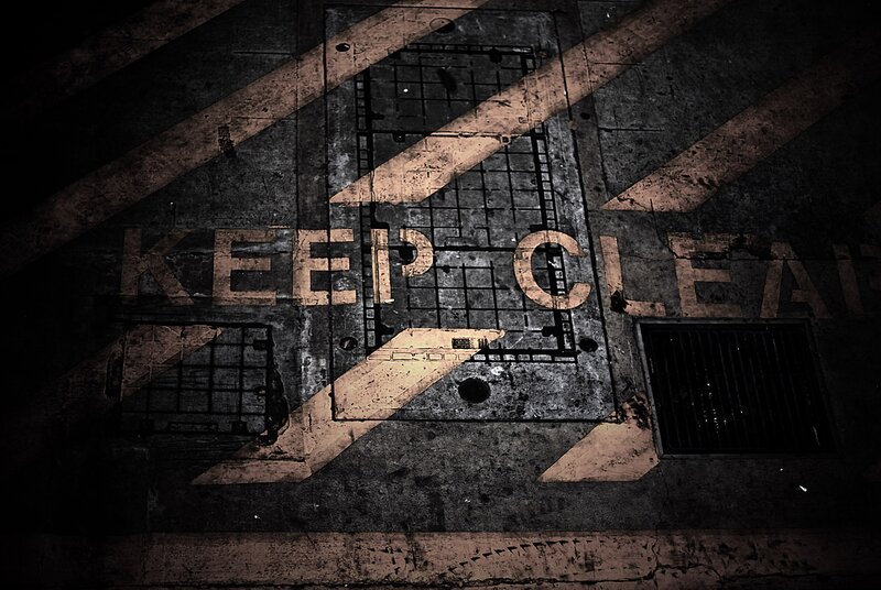 grungy keep clear sign
