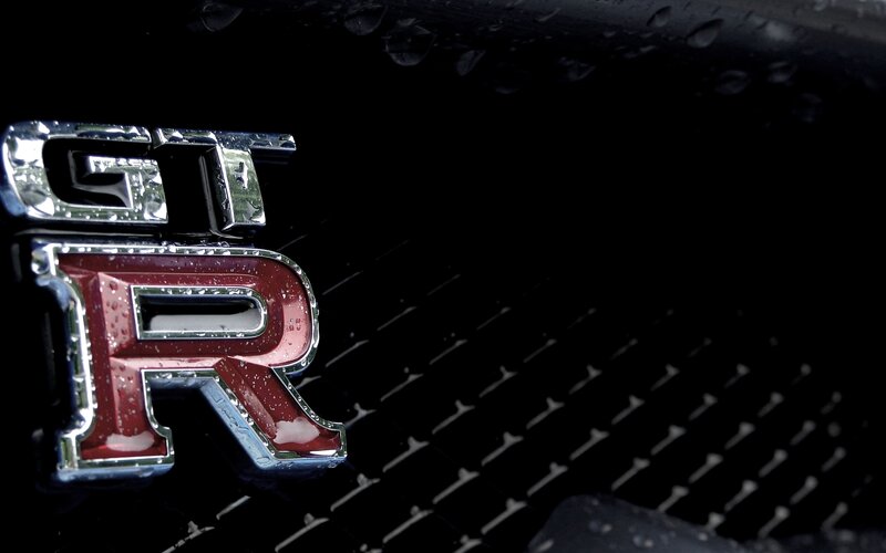 GT-R emblem on wet grille