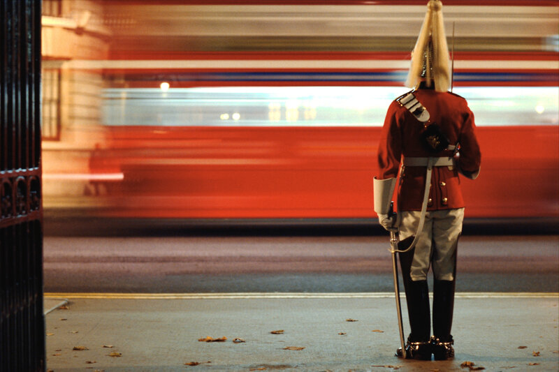 Guard standing at night