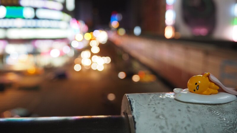 Gudetama Figurine on Railing