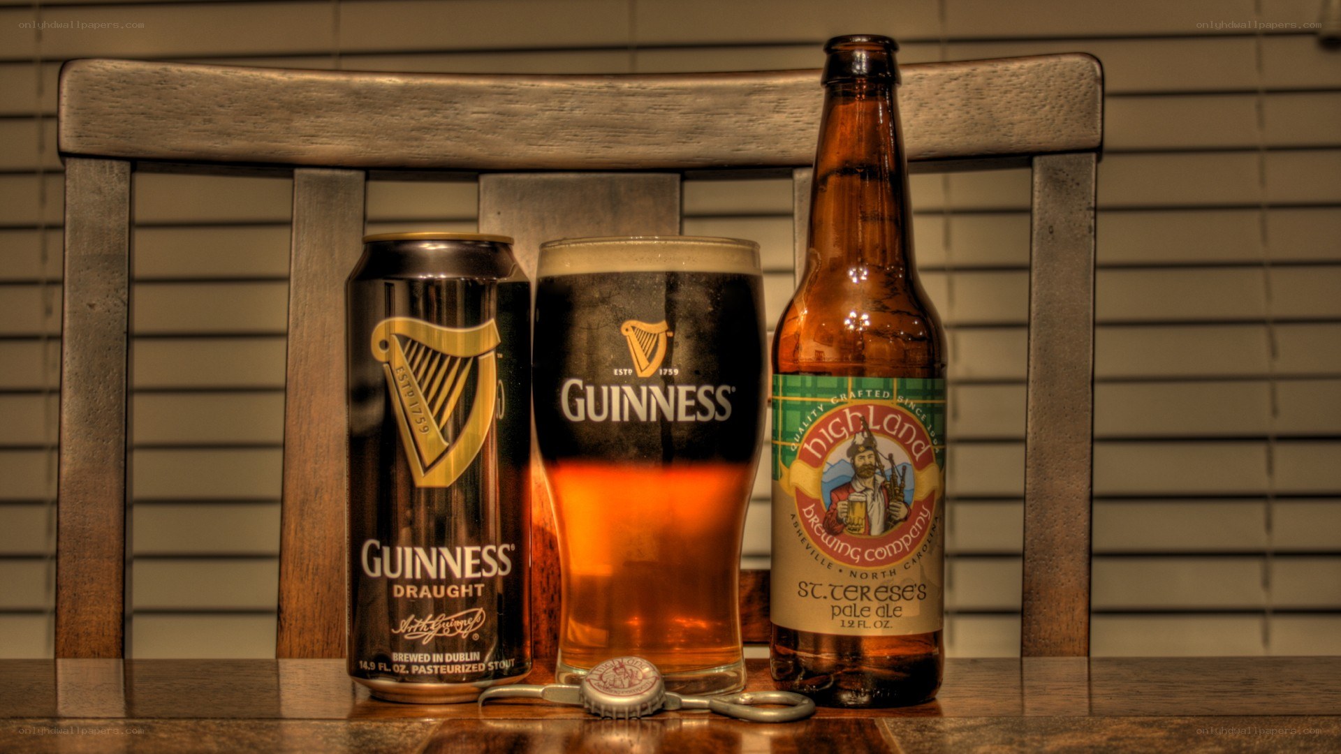 Guinness and beer bottle on table