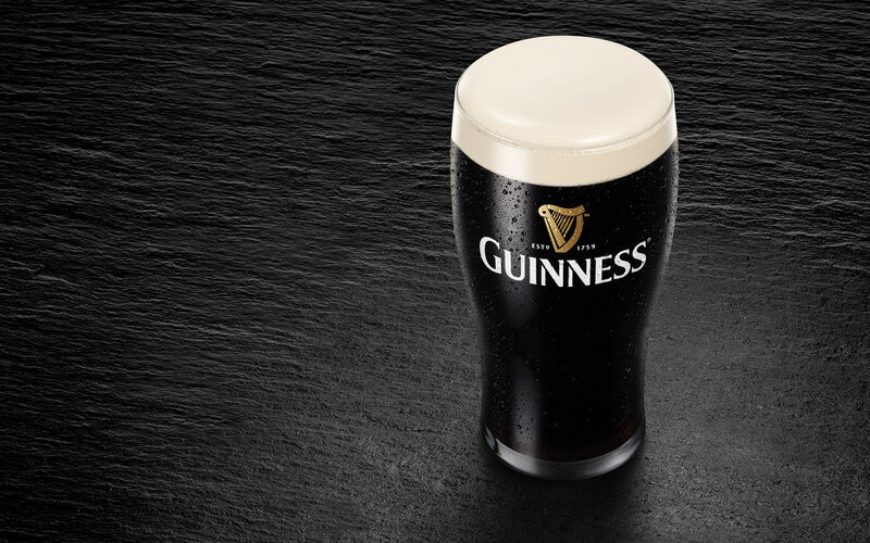 Guinness Beer in Glass — Black