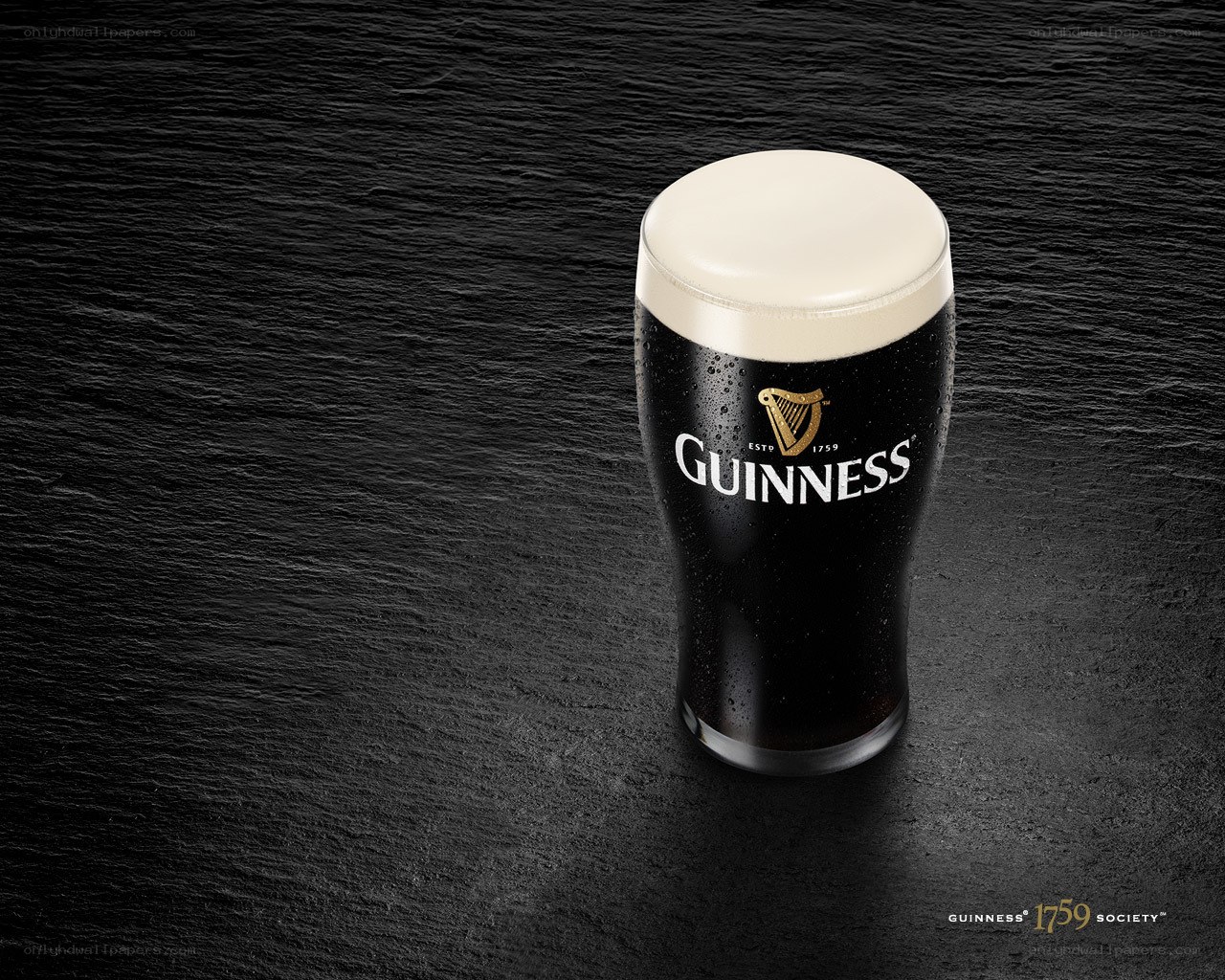 Guinness beer on black slate