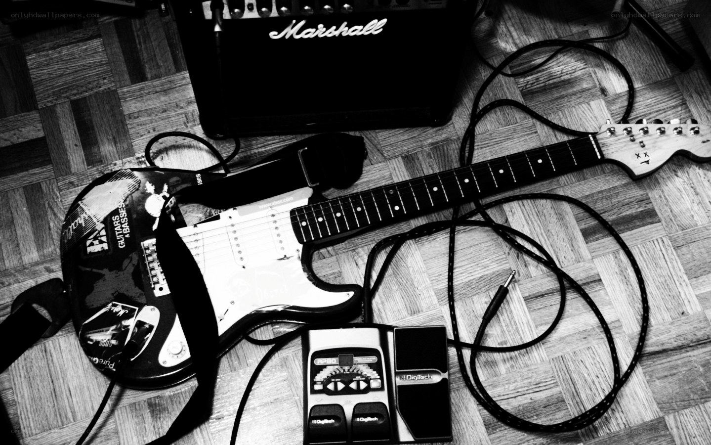 Guitar and amp on floor