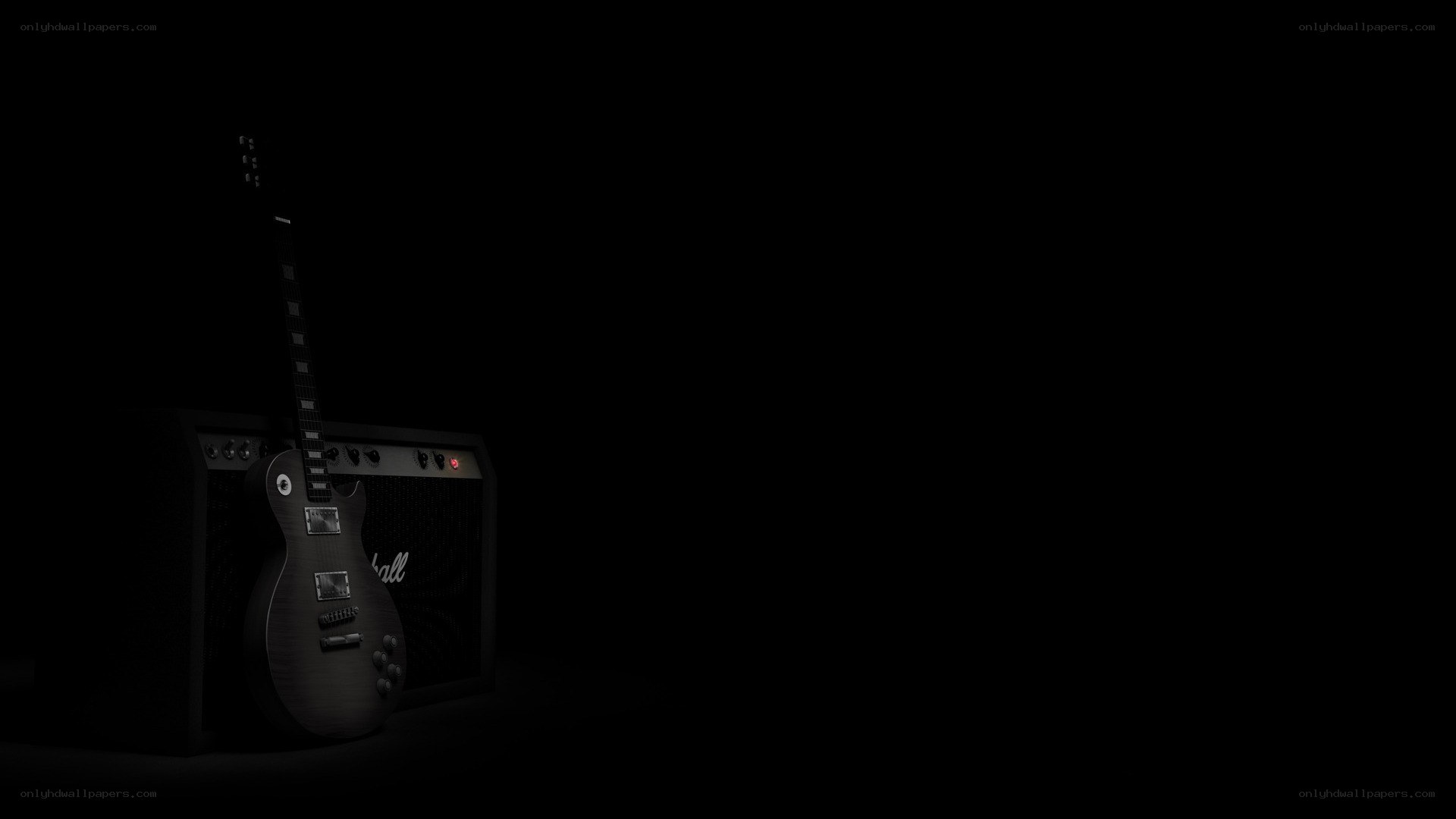 guitar and amplifier in darkness