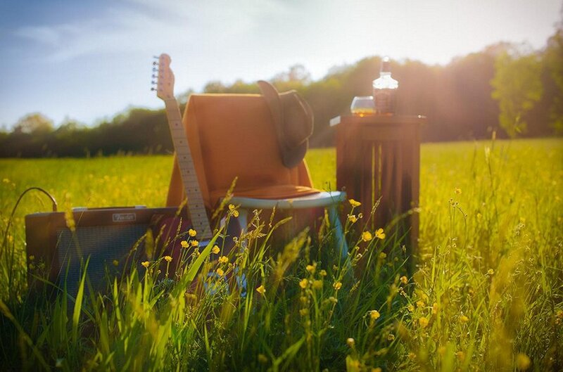Guitar and Amplifier in Field