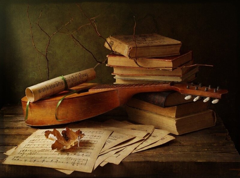 Guitar and Books on Table — Brown