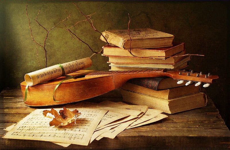 Guitar and Books on Table