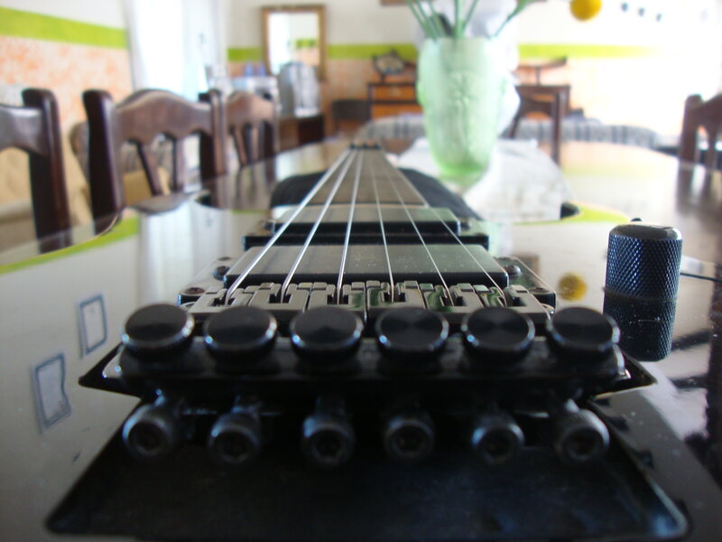 guitar bridge on a table