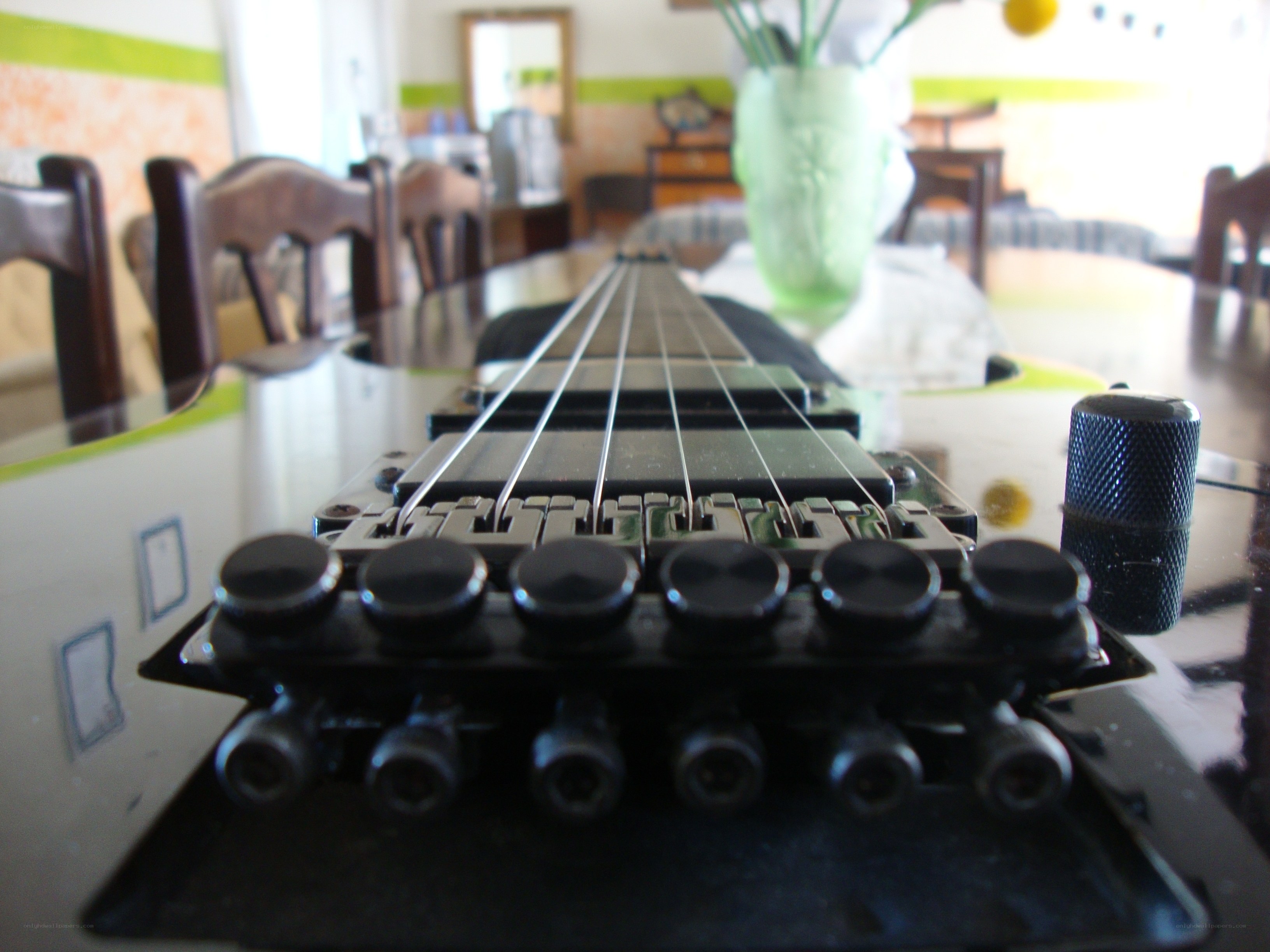 guitar bridge on a table