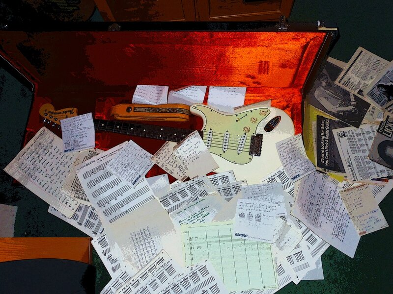 Guitar Case with Sheet Music
