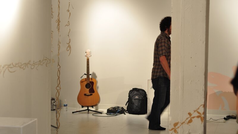 Guitar in art gallery space