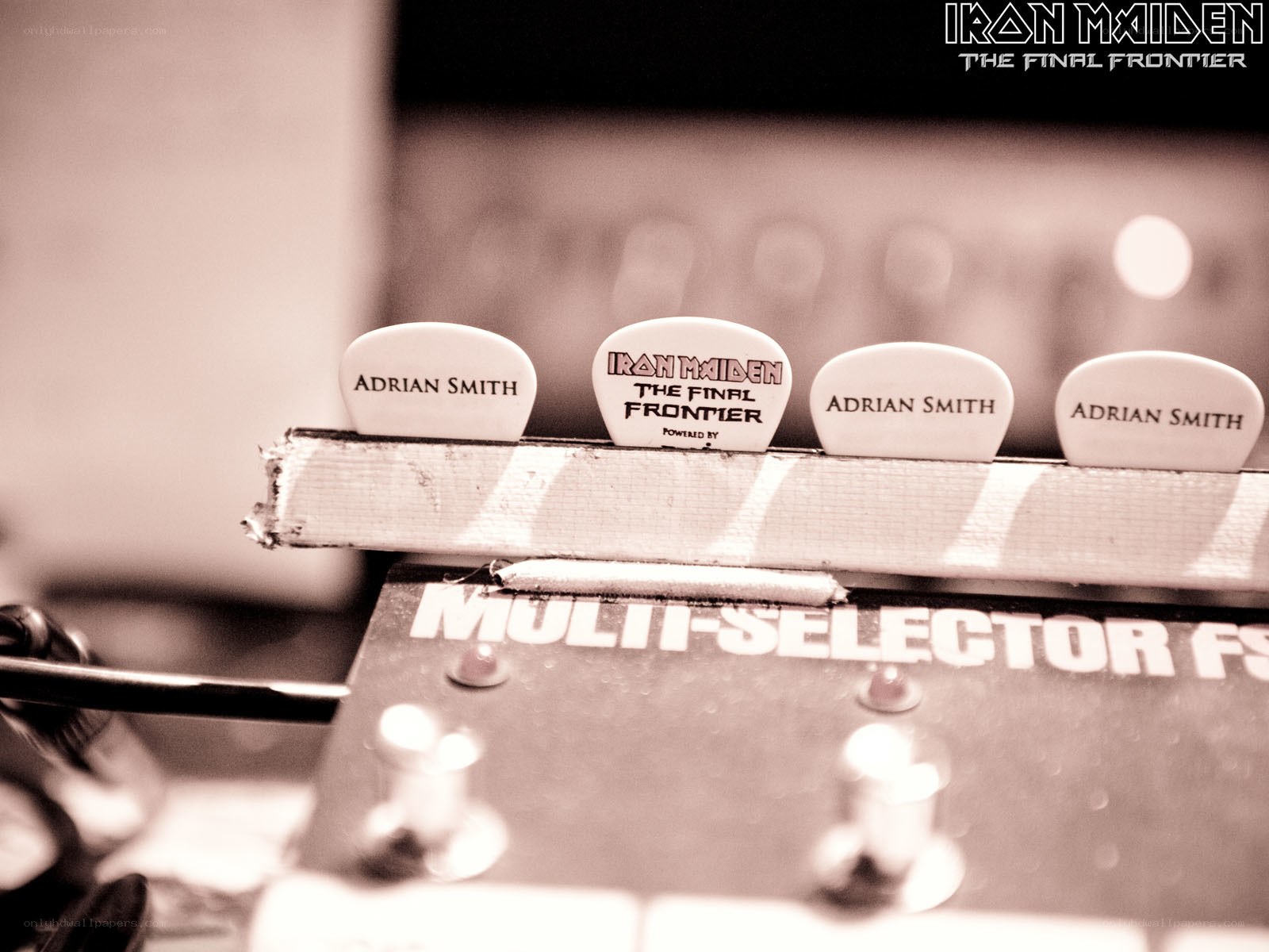 Guitar picks on a pedal