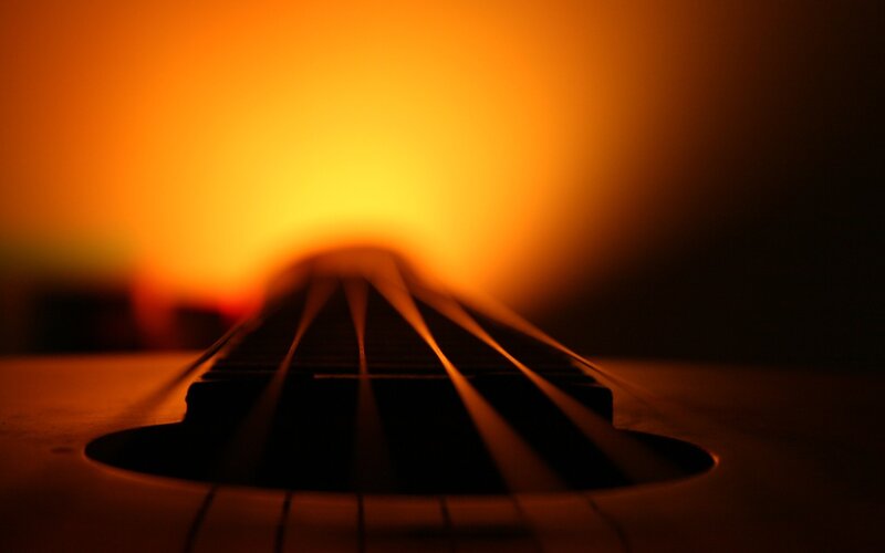 guitar strings at sunset