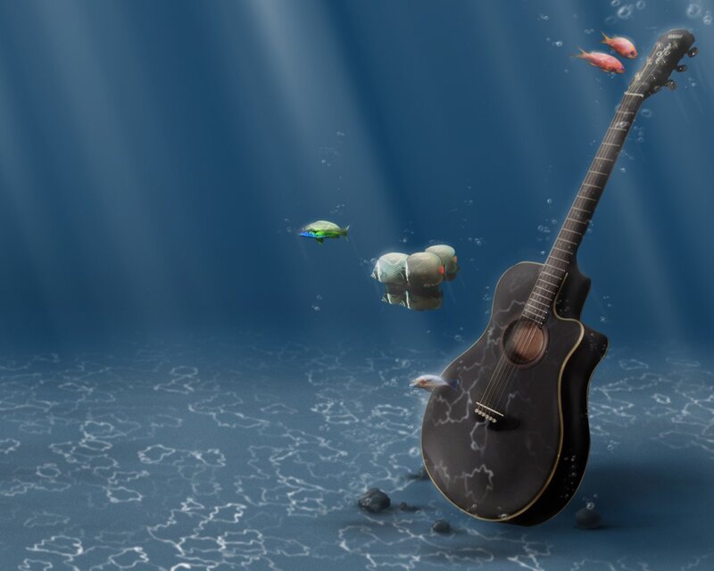 Guitar underwater with fish
