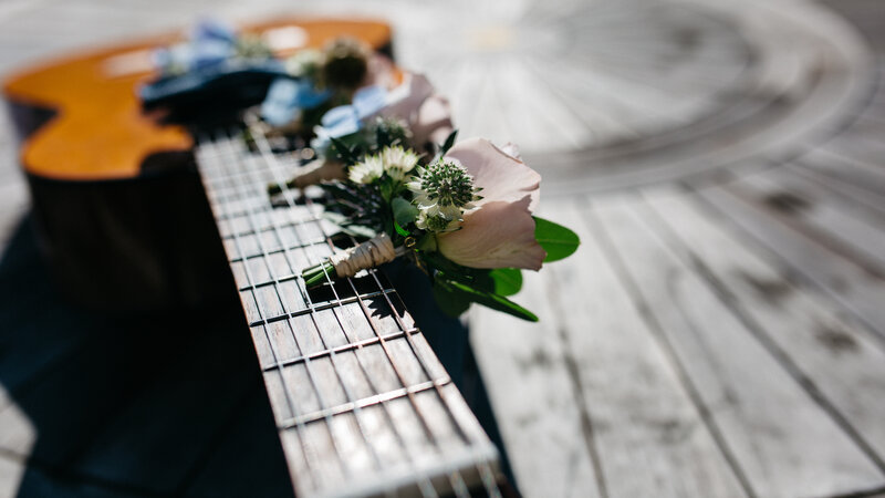 Guitar with floral boutonniere