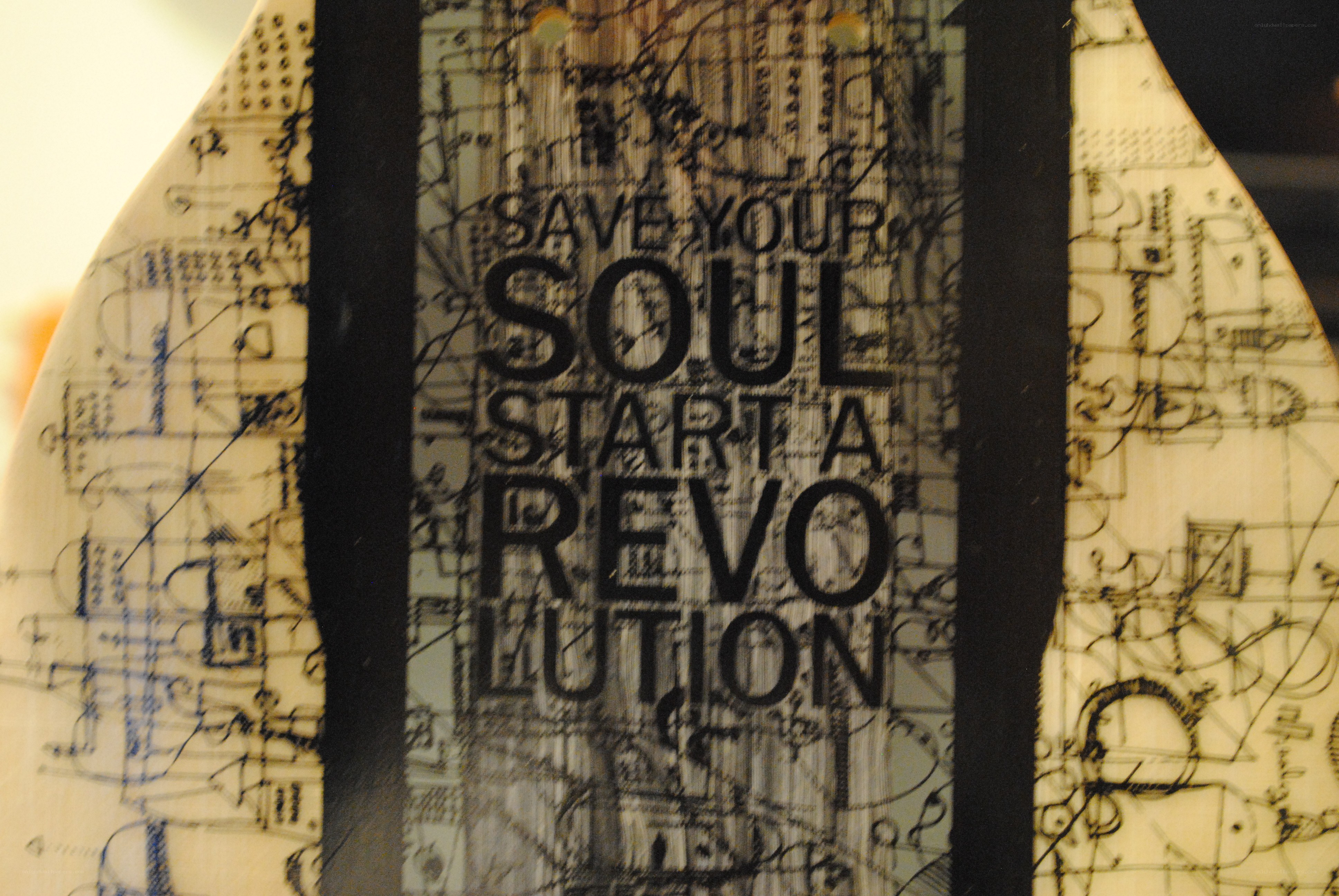 guitar with inspirational quote