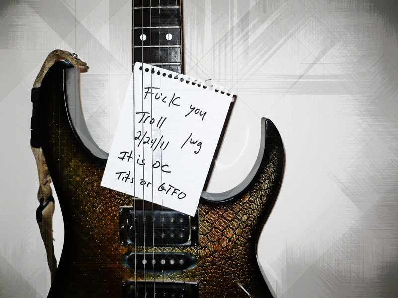 Guitar with note attached