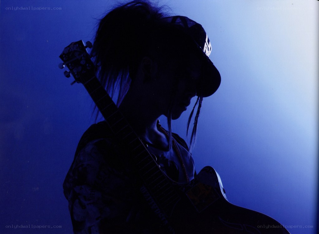guitarist in blue light