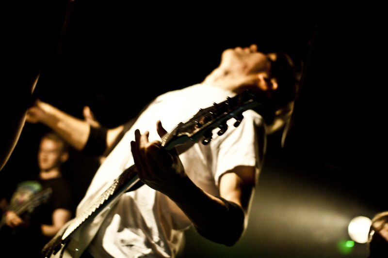 Guitarist on Stage — Black, Dramatic