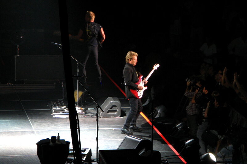 Guitarist on Stage — Black, Energetic, Night, Photograph, Audience