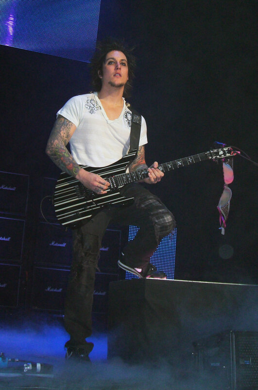 Guitarist on Stage — Black, Energetic, Night, Photograph, Guitar, Amplifiers