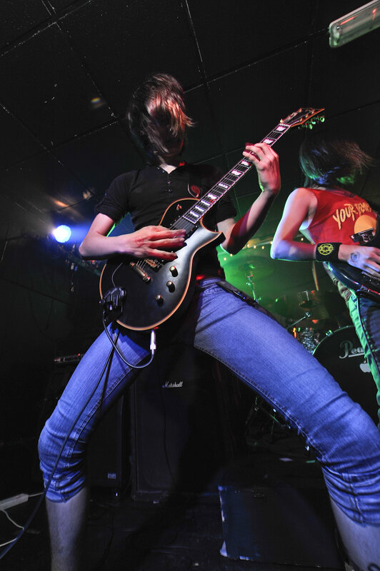 Guitarist on Stage — Black, Energetic, Night, Photograph, Guitar