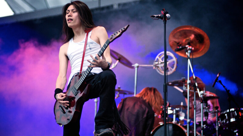 Guitarist on Stage — Purple