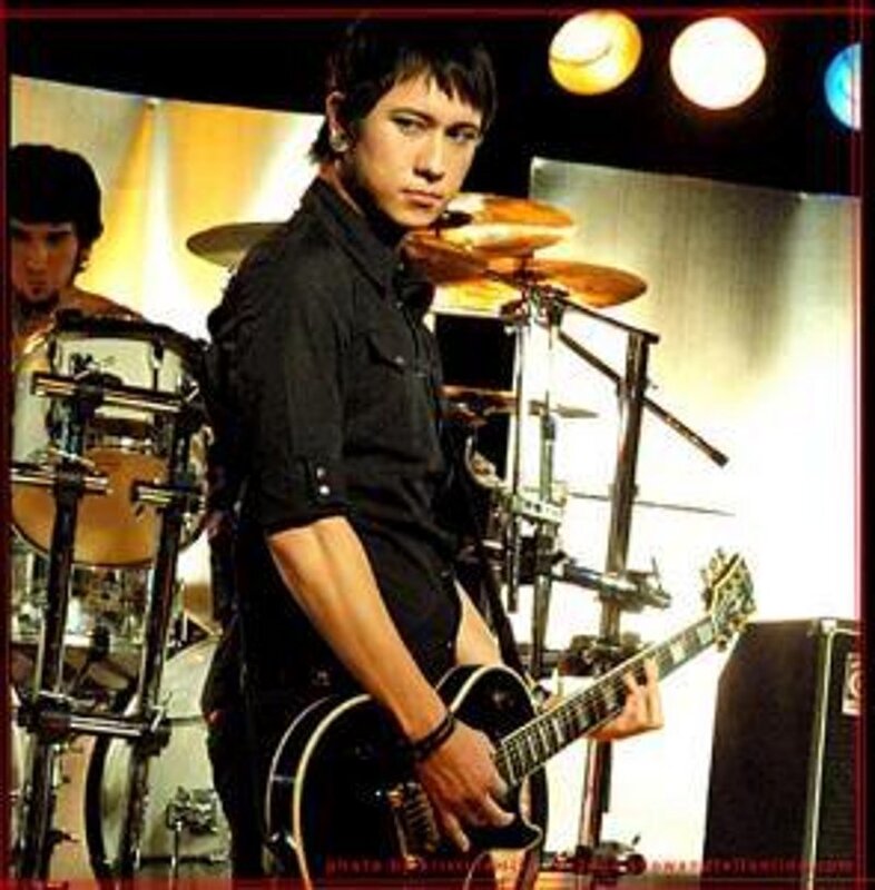 guitarist on stage with band