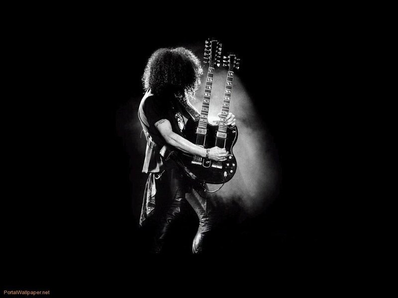 guitarist on stage with double guitar