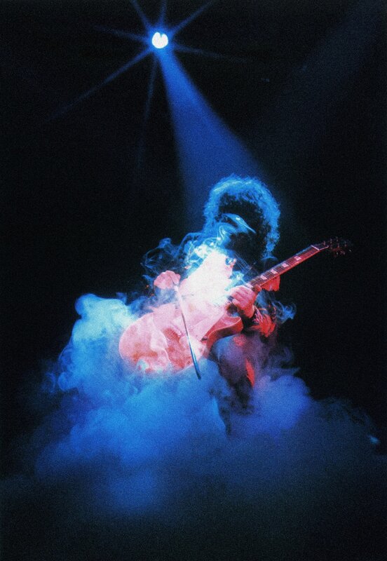 guitarist on stage with smoke