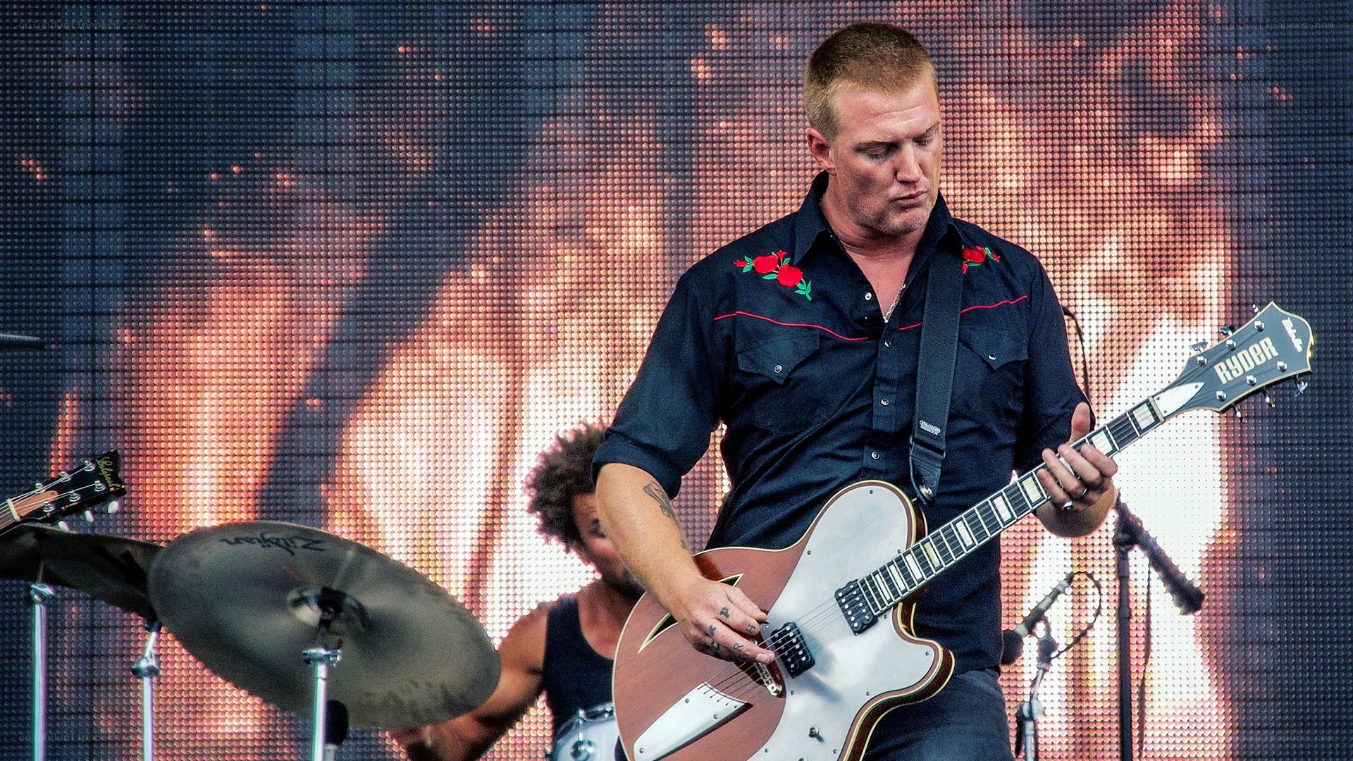 guitarist performing on stage