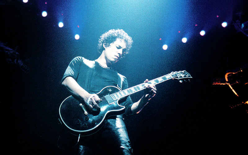 guitarist performing on stage