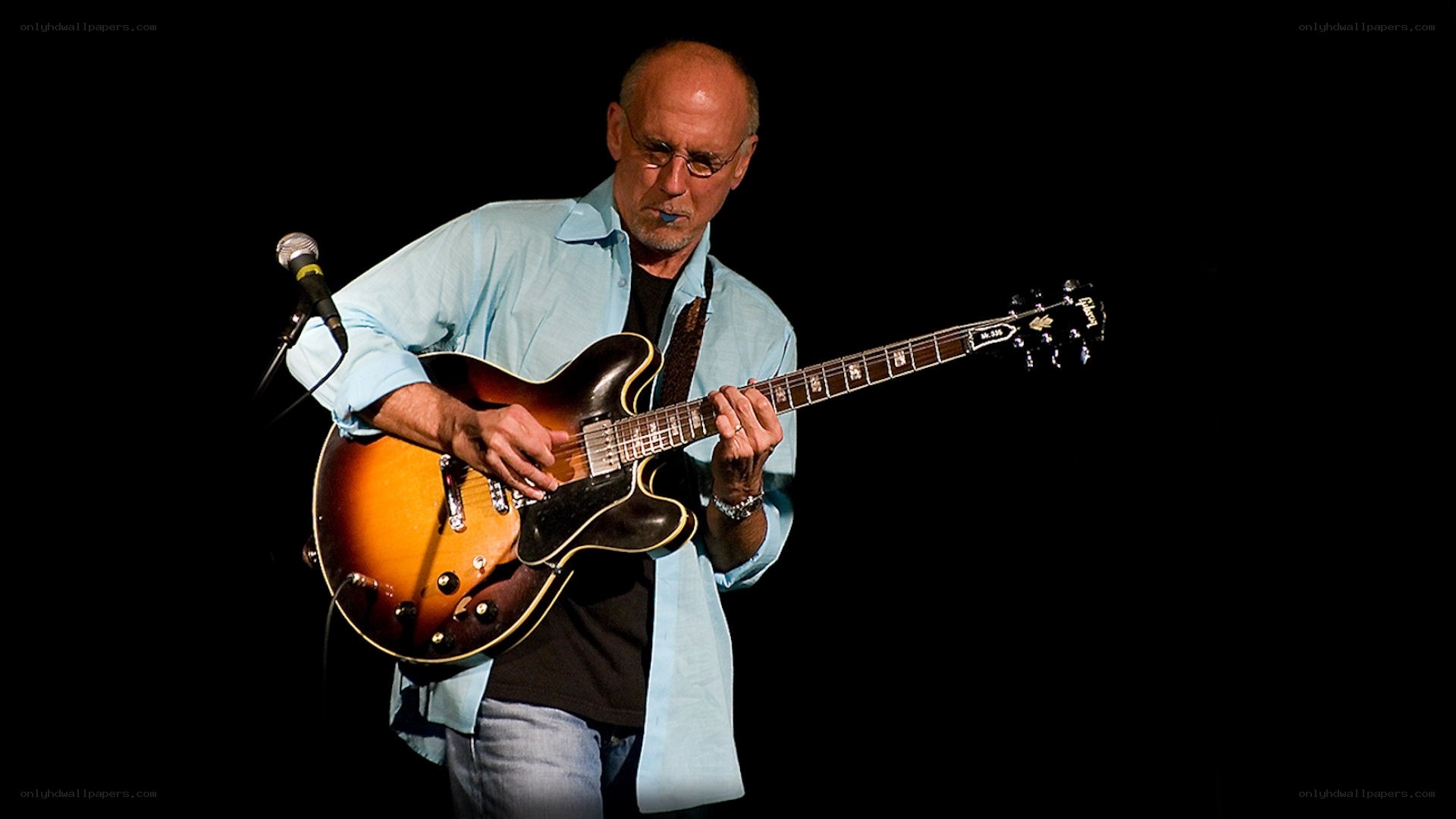 guitarist performing on stage