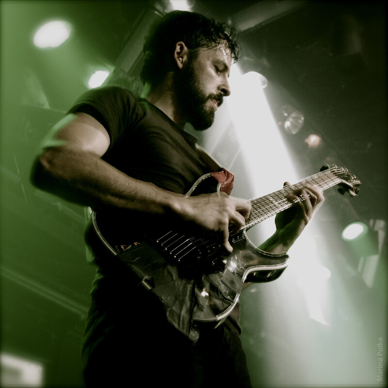 guitarist performing on stage