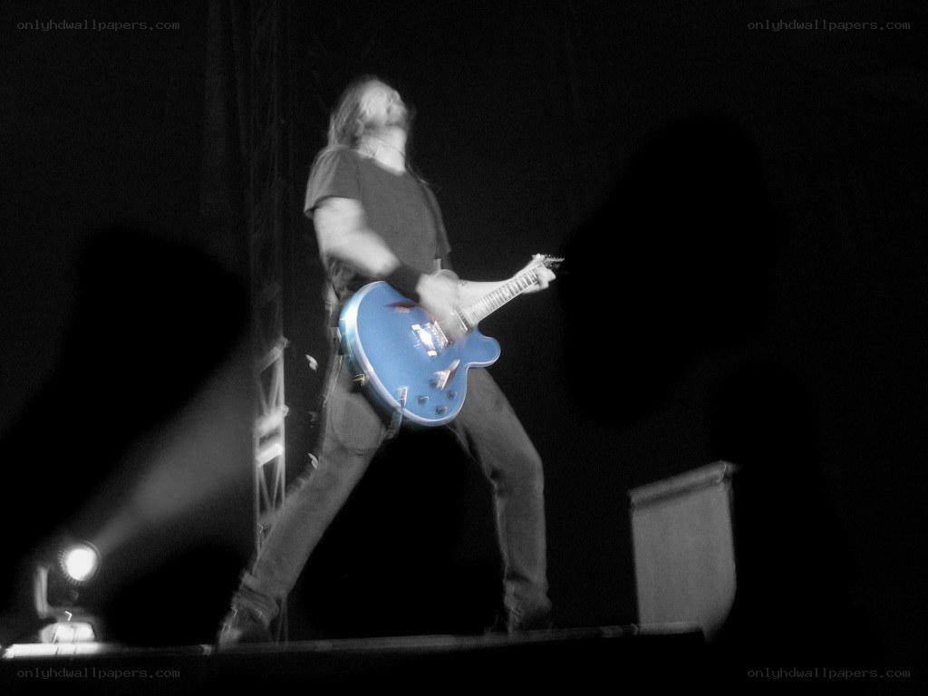 guitarist performing on stage
