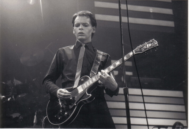 guitarist performing on stage