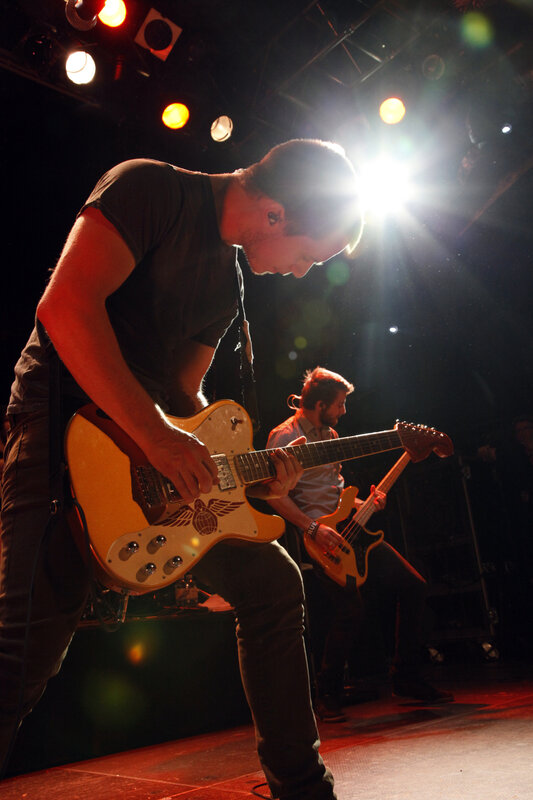 Guitarist performing on stage