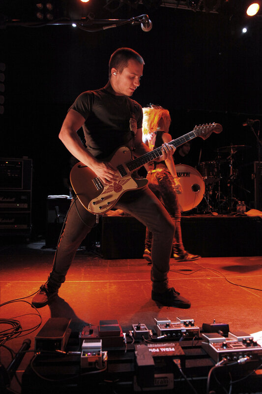 Guitarist performing on stage