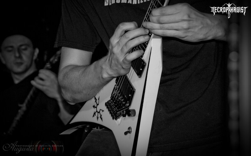 guitarist performing on stage