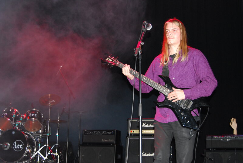 guitarist performing on stage