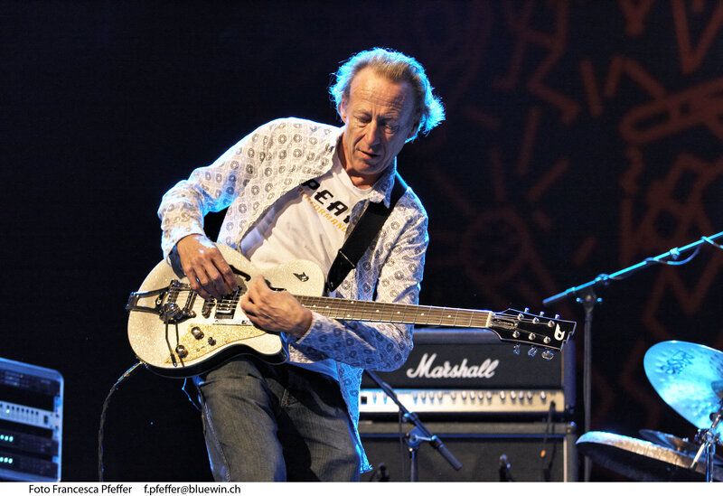 guitarist performing on stage