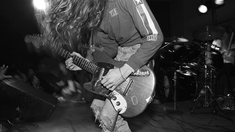 guitarist performing on stage